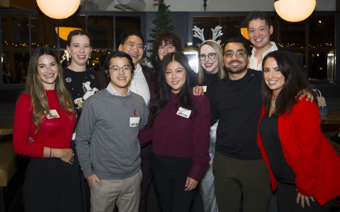 a group of people posing for a photo