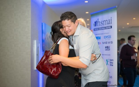 a man hugging a woman