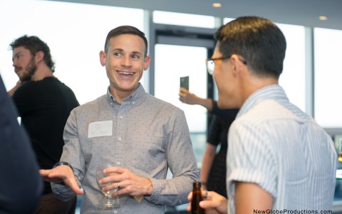 a man talking to another man