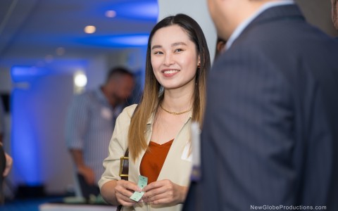 a woman smiling at a man