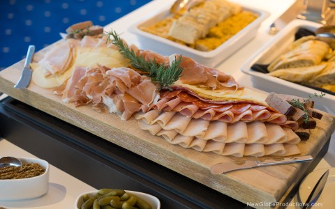 a tray of meat and cheese