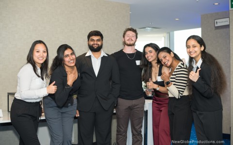 a group of people posing for a photo