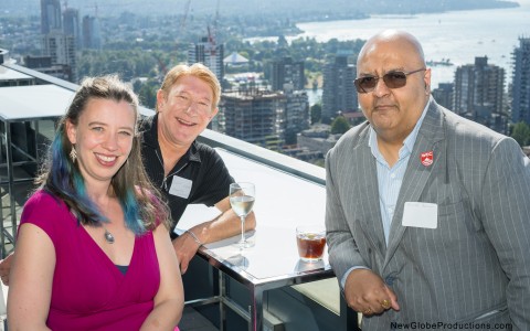 a group of people sitting at a table with drinks