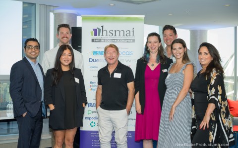 a group of people posing for a photo