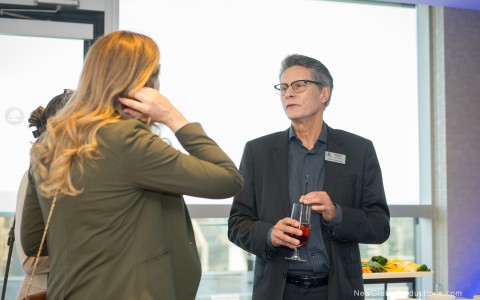 a man and woman talking to each other