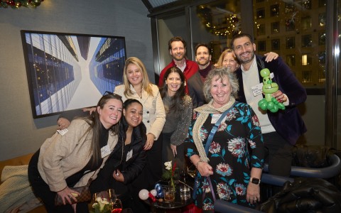 a group of people posing for a photo