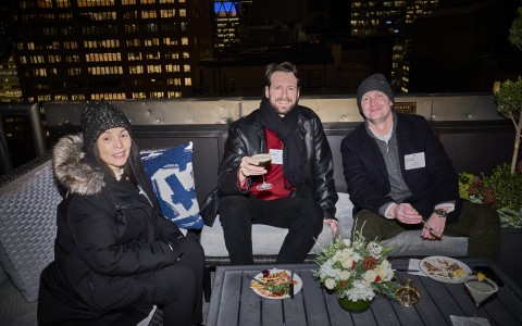 a group of people sitting on a couch