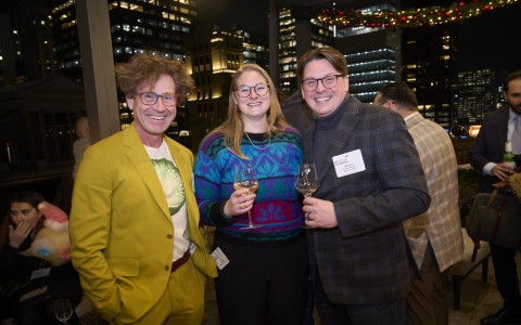 a group of people posing for a photo