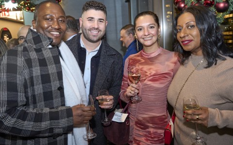 a group of people posing for a photo