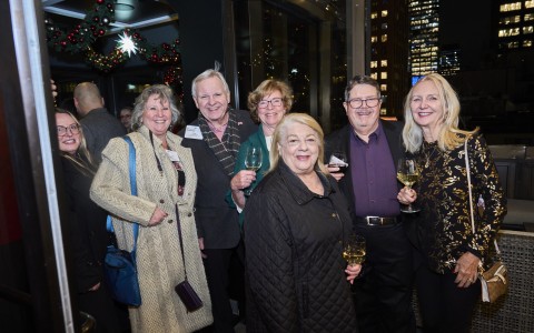 a group of people posing for a photo