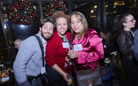 a group of people posing for a photo