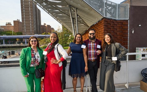 a group of people posing for a photo