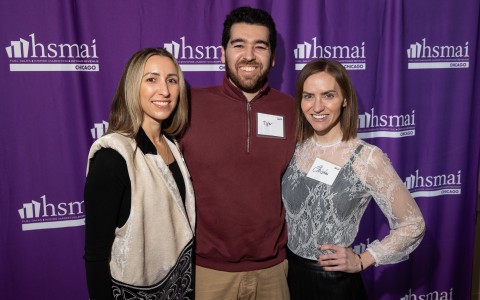 a group of people posing for a photo