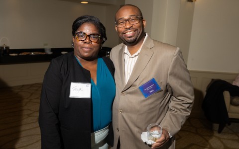 a man and woman standing together
