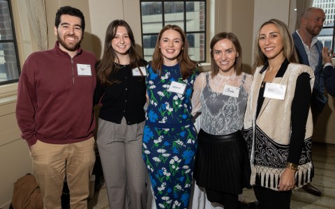a group of people posing for a photo