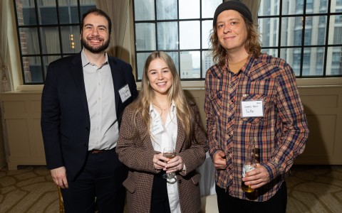 a group of people posing for a photo