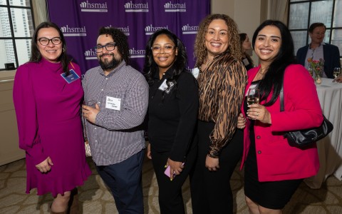 a group of people posing for a photo