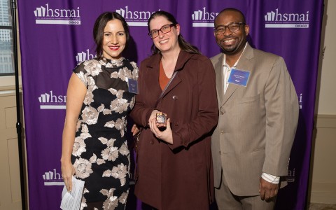 a group of people posing for a photo