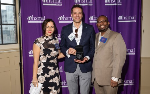 a group of people posing for a photo