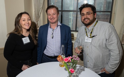 a group of people posing for a photo