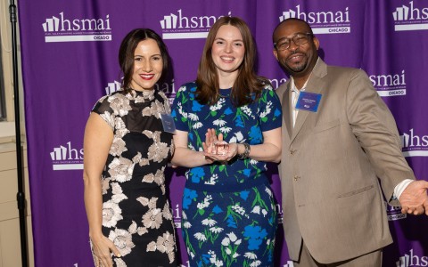 a group of people posing for a photo
