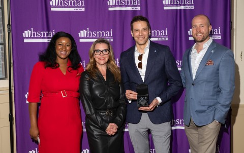 a group of people posing for a photo