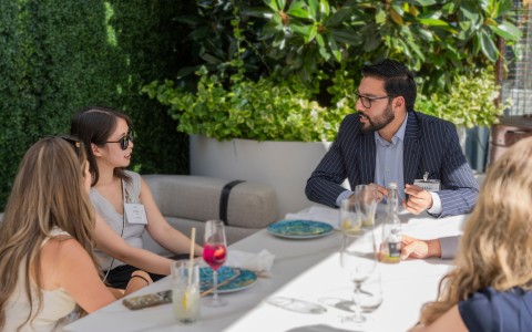 a man and woman sitting at a table