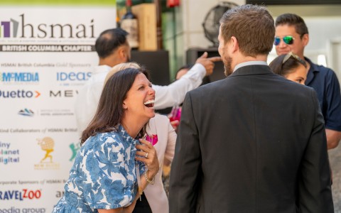 a woman laughing at a man