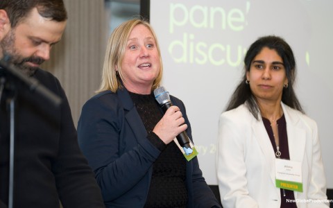 a woman holding a microphone