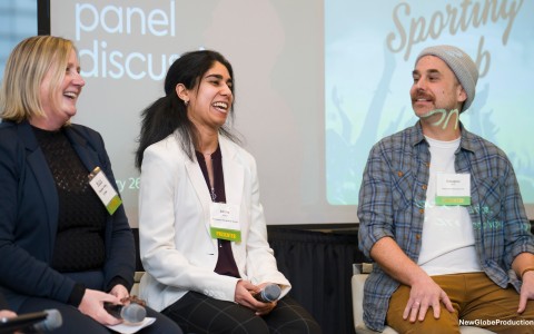 a group of people sitting in chairs