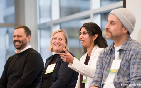 a group of people sitting in a room