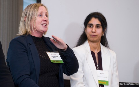 a woman talking to another woman