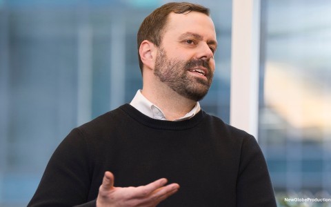 a man in a black sweater