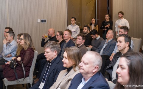 a group of people sitting in chairs