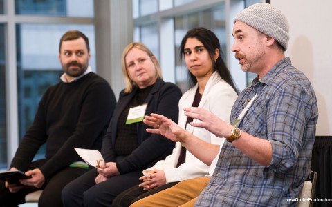 a group of people sitting in a room