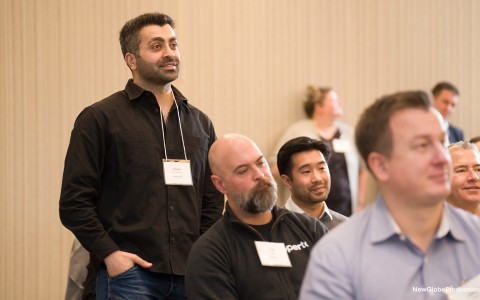 a man standing in front of a group of people