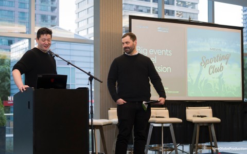 a man standing in front of a microphone