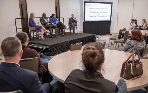 a group of people sitting around a table