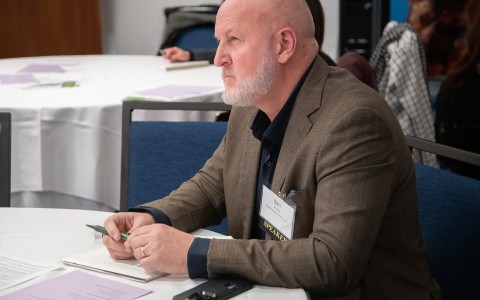 a man sitting at a table
