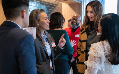 a group of people standing in a room