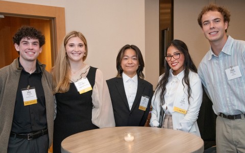 a group of people posing for a photo