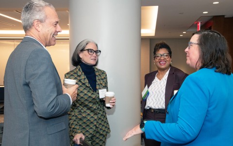 a group of people standing in a room
