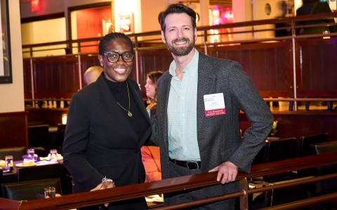 a man and woman standing next to each other
