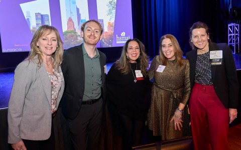 a group of people posing for a photo