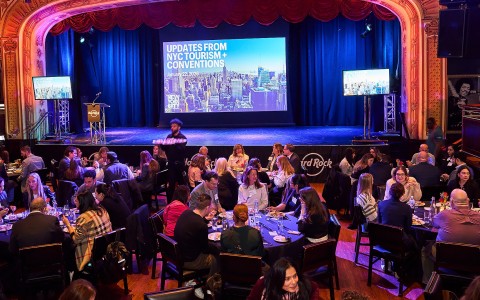 a group of people sitting around a table
