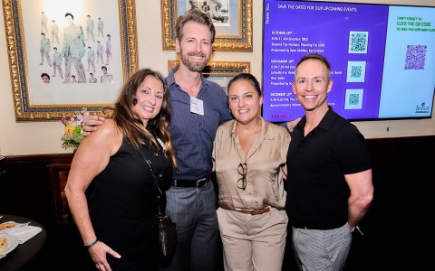 a group of people posing for a photo