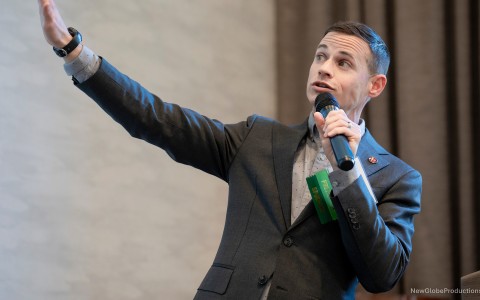 a man holding a microphone