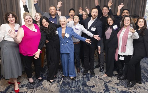 a group of people posing for a photo