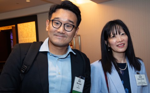 a man and woman smiling