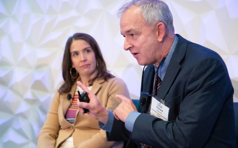a man and woman sitting in chairs